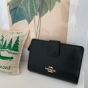 Black coach bifold wallet